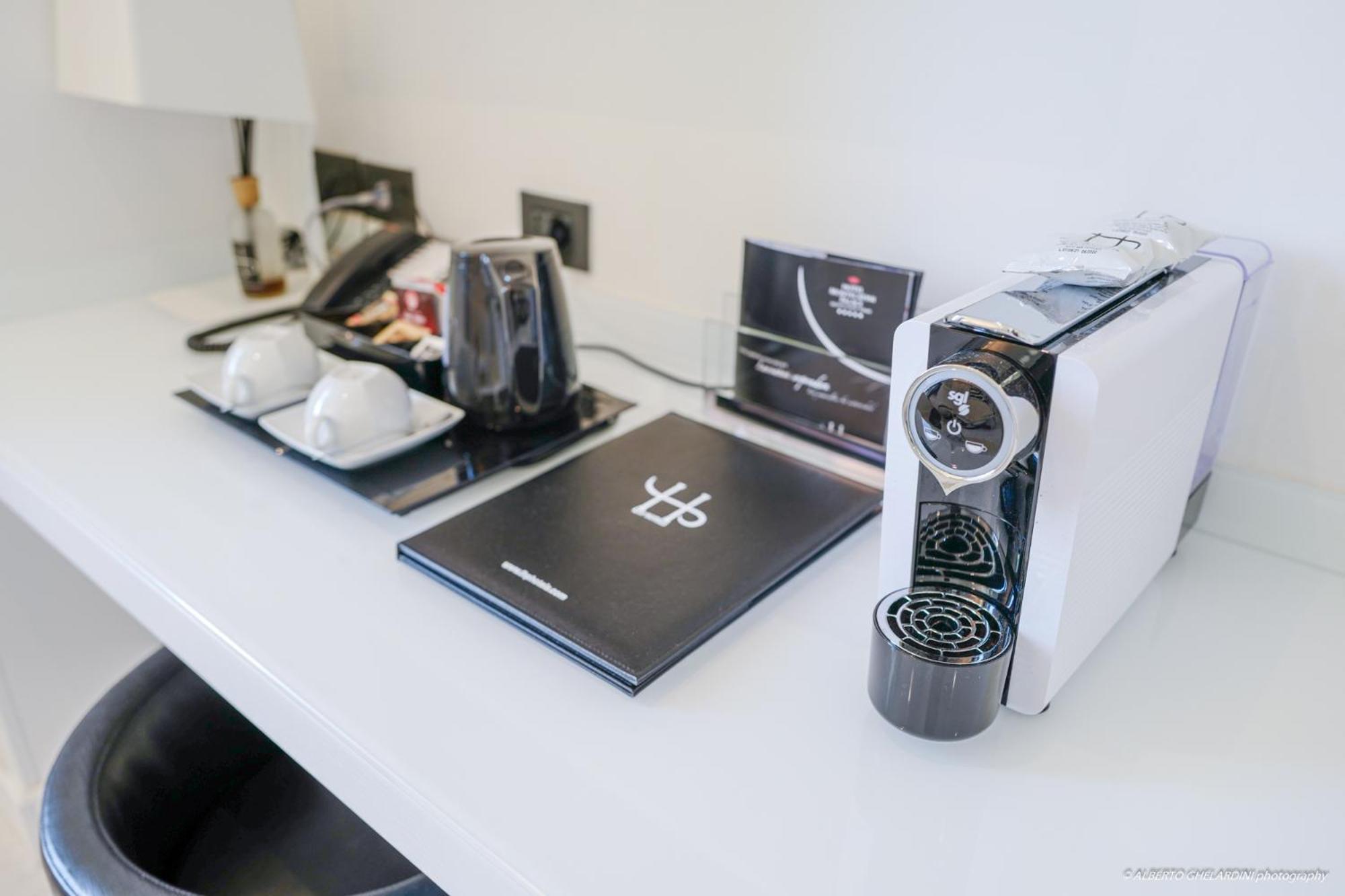 Lhp Hotel Montecatini Palace & Spa Kültér fotó A Nespresso coffee machine in a hotel room